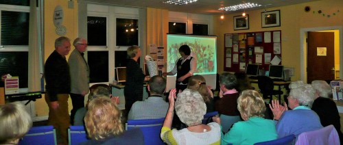 Berni Williams, Silverdale Library's amazing supevisor, receiving a medal for being the fastest tickt-seller on the tour when the verse-drama TOWN came to Silverdale!